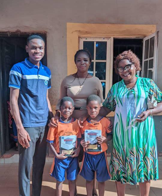 Student receiving scholarship certificate at Pathfinder Champions League